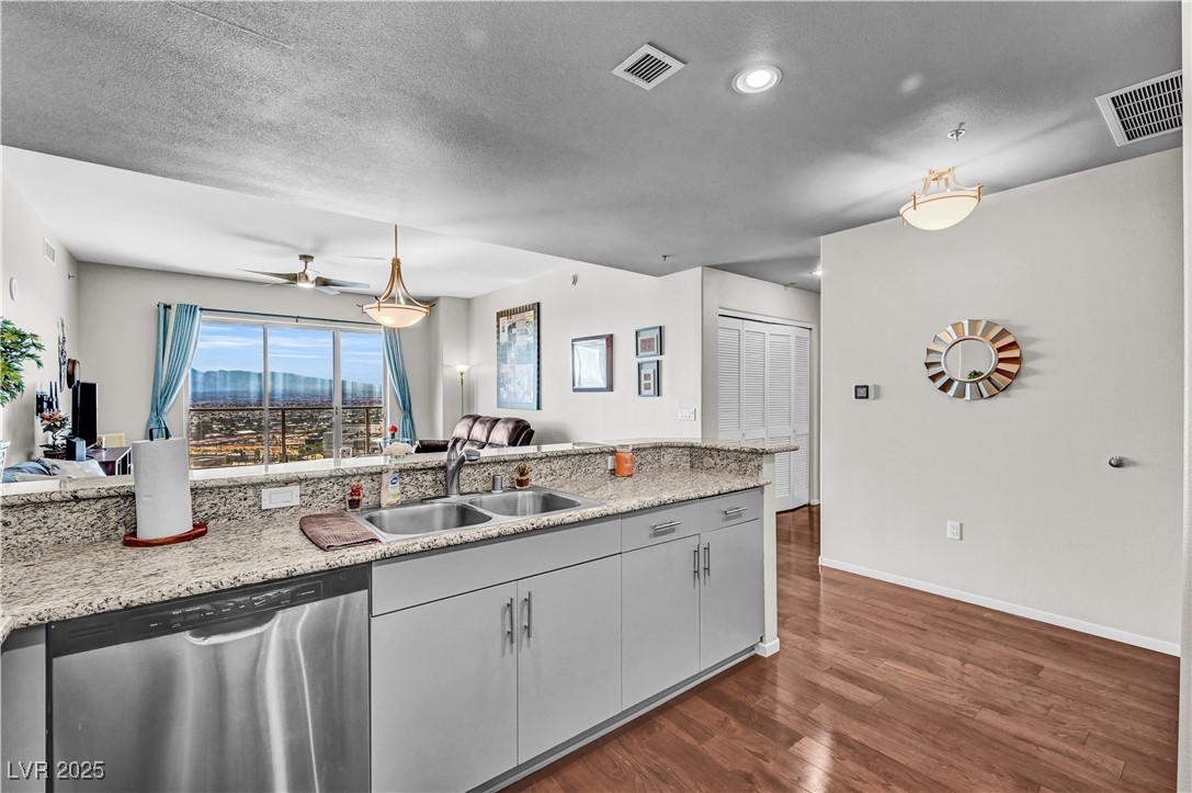 8255 South Las Vegas Boulevard, Unit 1715 Las Vegas, NV 89123 - Photo 6 of 49 Breakfast bar easily accommodates 3-4 barstools.