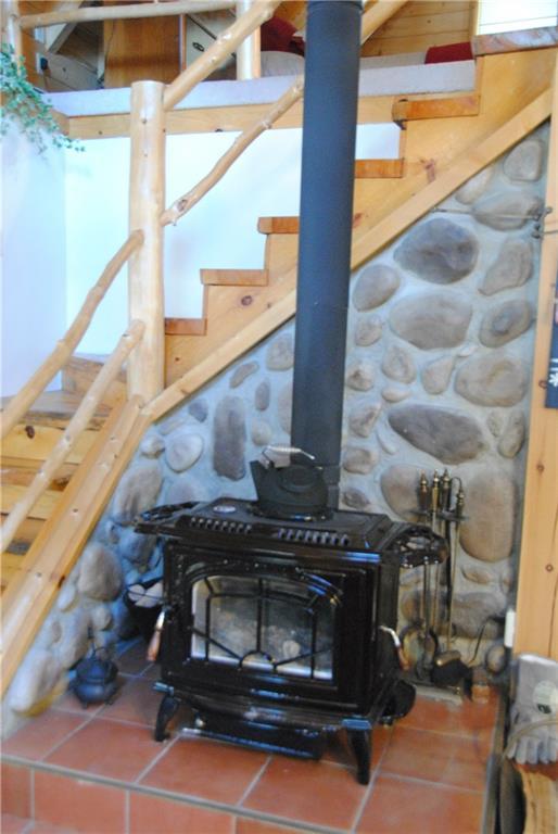 74 Blanchard Avenue Stratton, ME 04982 - Photo 15 of 35 Wood stove.