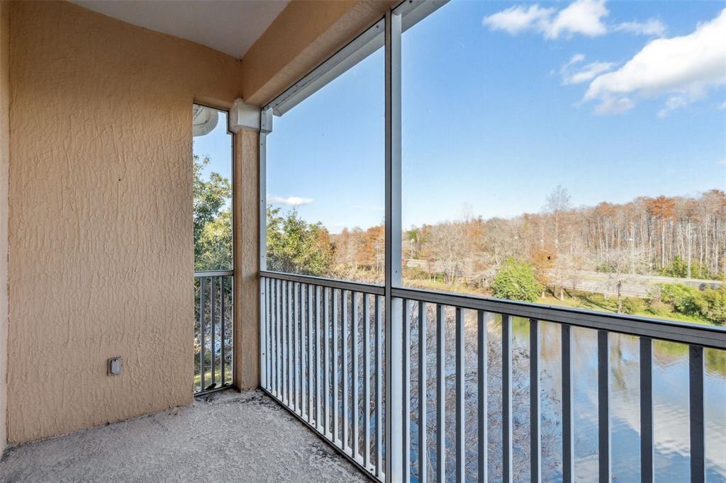 13560 Turtle Marsh Loop, Unit 21 Orlando, FL 32837 - Photo 16 of 30 a view of balcony with furniture