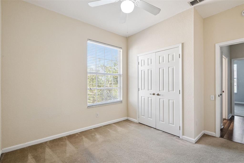 13560 Turtle Marsh Loop, Unit 21 Orlando, FL 32837 - Photo 20 of 30 a view of an empty room with a window