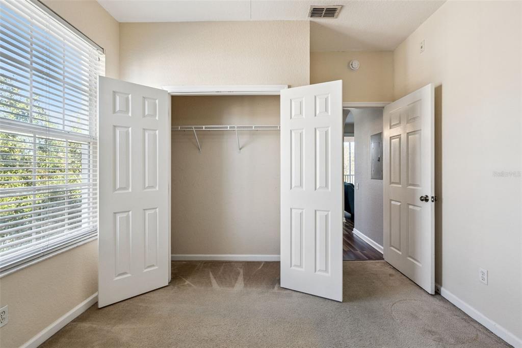 13560 Turtle Marsh Loop, Unit 21 Orlando, FL 32837 - Photo 21 of 30 a view of an empty room with a fireplace