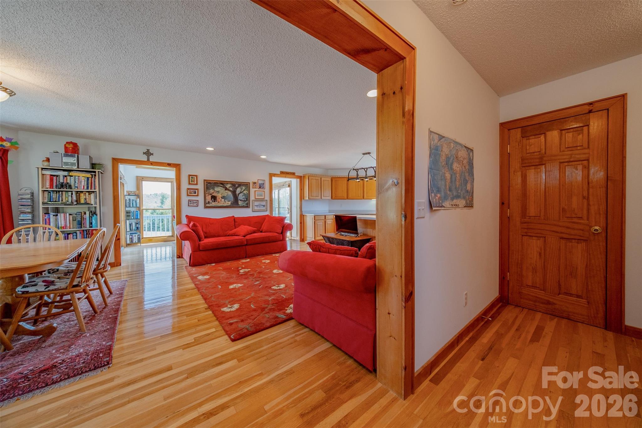 216 Deer Track Lane Sparta, NC 28675 - Photo 20 of 44 a view of living room filled with furniture and wooden floor