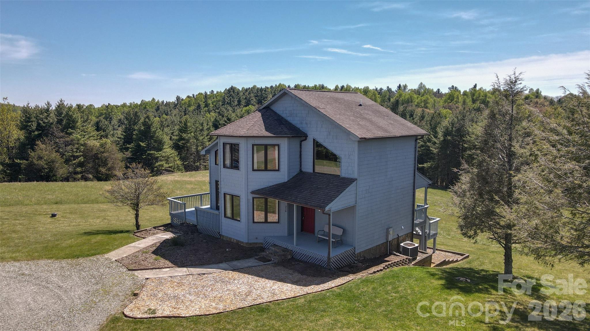 216 Deer Track Lane Sparta, NC 28675 - Photo 3 of 44 an aerial view of a house