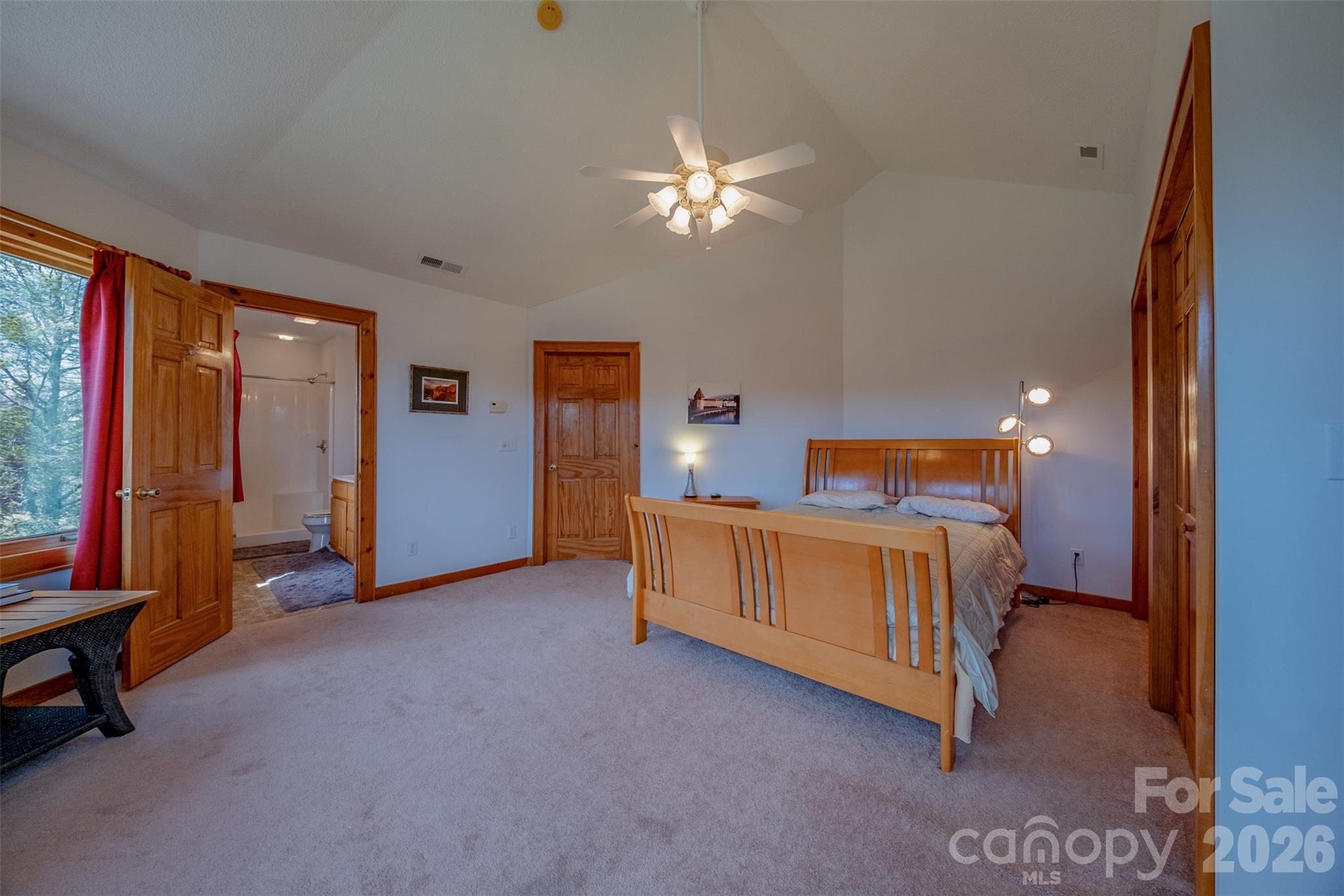 216 Deer Track Lane Sparta, NC 28675 - Photo 31 of 44 a bed room with a bed and a lamp