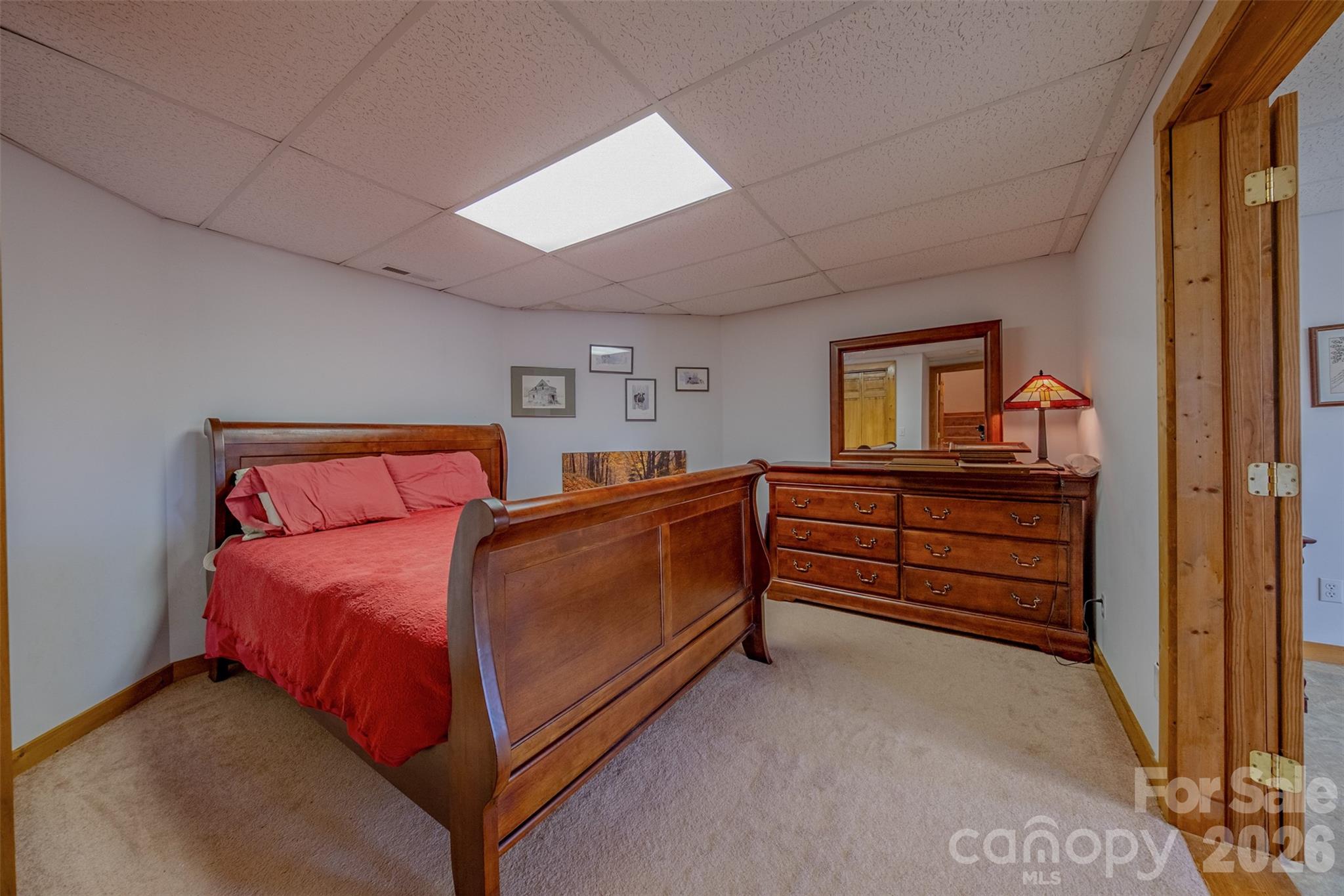 216 Deer Track Lane Sparta, NC 28675 - Photo 42 of 44 a bed room with a bed and a dresser