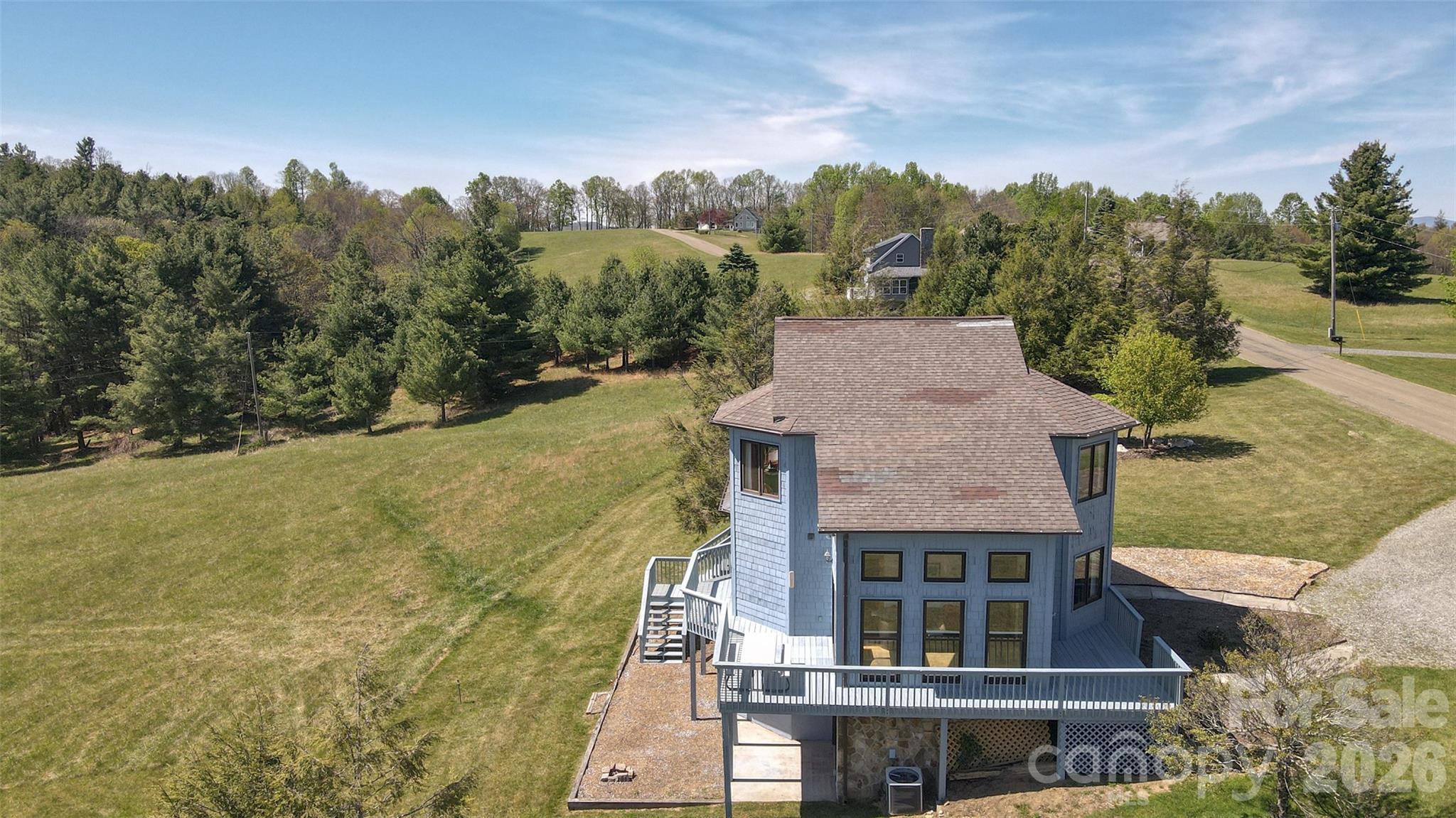216 Deer Track Lane Sparta, NC 28675 - Photo 8 of 44 a aerial view of a house with a yard