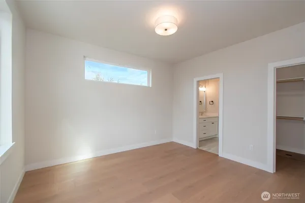 an empty room with a bathroom
