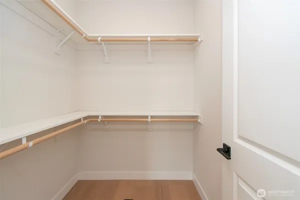 a view of an empty walk in closet