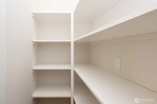 a hallway with closet