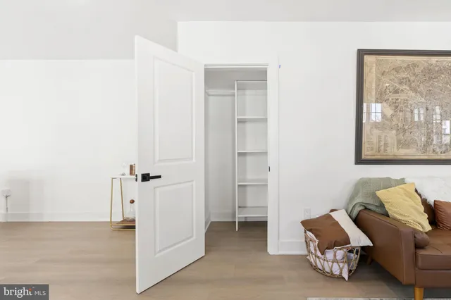 a room with furniture and a window