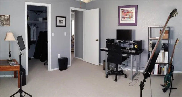 a view of a workspace with furniture