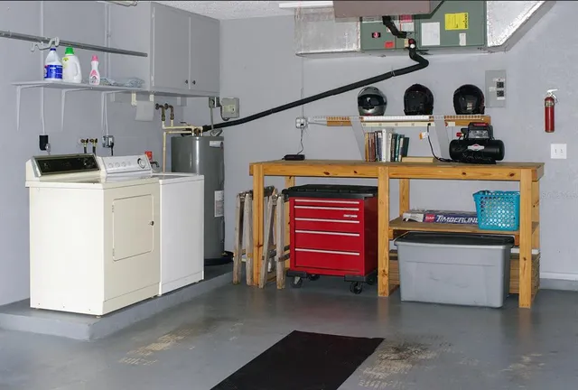 a utility room with dryer and washer