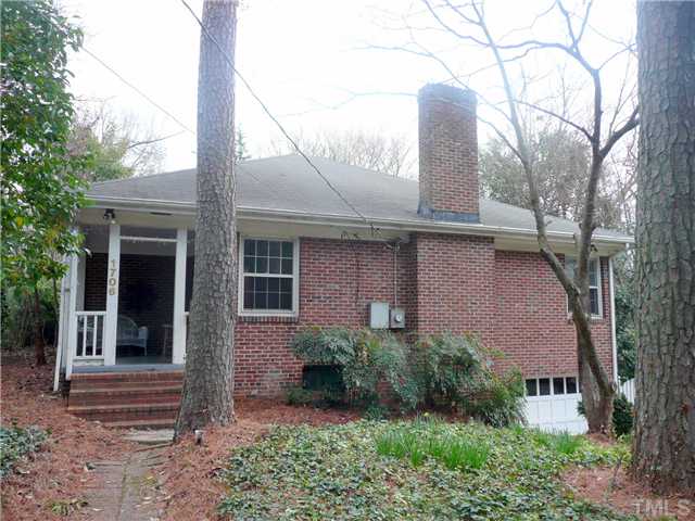 1706 Pineview Street Raleigh, NC 27608 - Photo 2 of 12 a front view of a house with garden