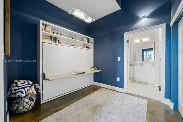 an entryway with a ceiling fan