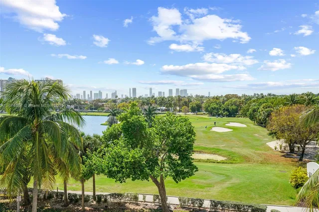 a view of a lake with a yard