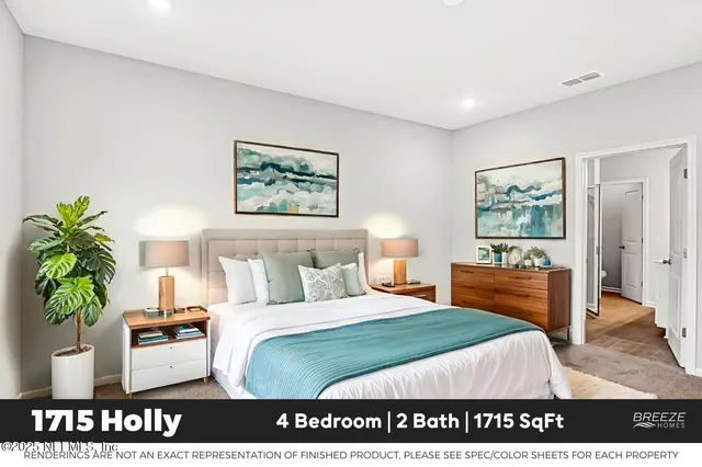 a bedroom with a bed and a potted plant