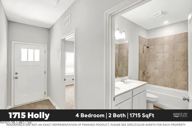 a bathroom with a shower a sink and a mirror