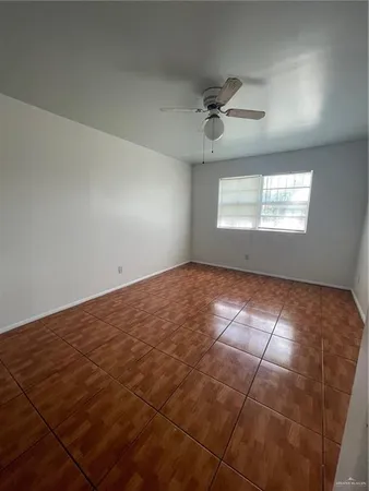 a view of empty room with windows