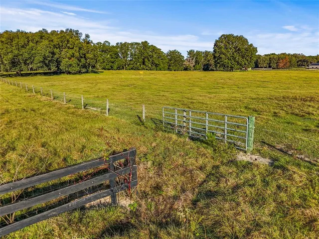 a view of swimming pool with an ocean view