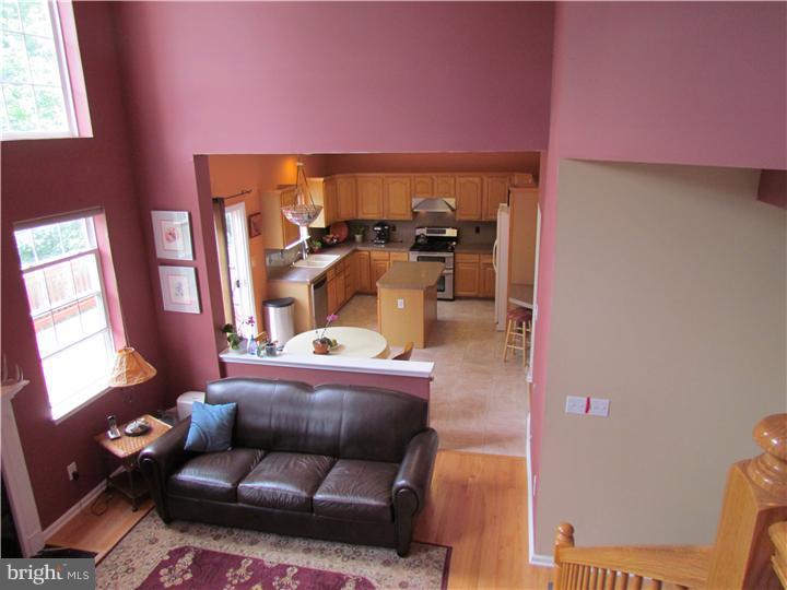 5 Coburn Road Pennington, NJ 08534 - Photo 14 of 25 a living room with furniture and a window