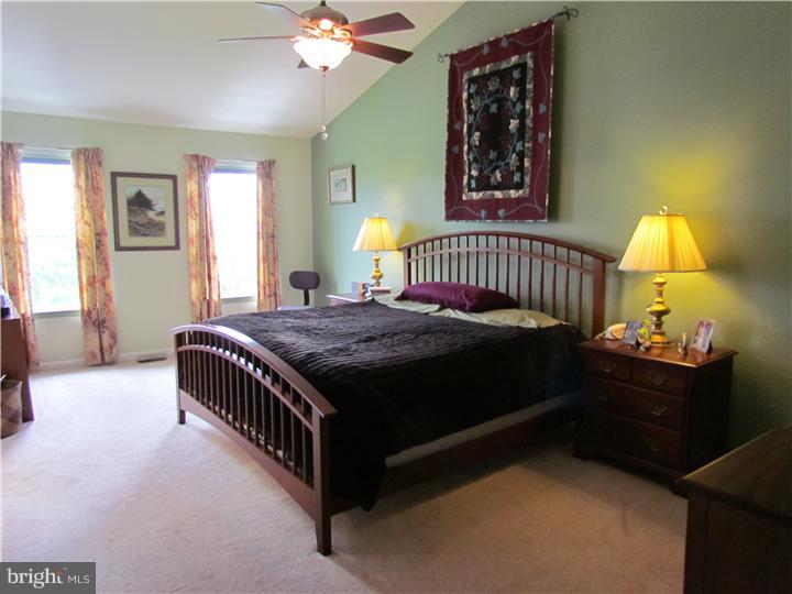 5 Coburn Road Pennington, NJ 08534 - Photo 15 of 25 a bedroom with a bed and window
