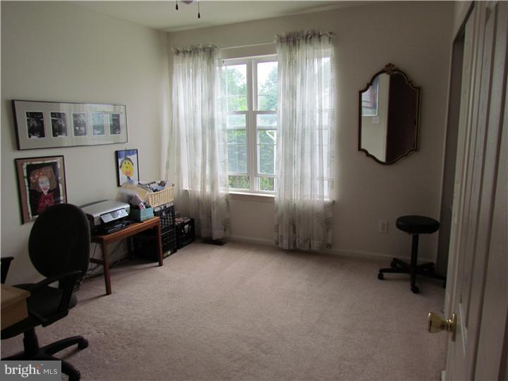 5 Coburn Road Pennington, NJ 08534 - Photo 18 of 25 a living room with furniture and a window