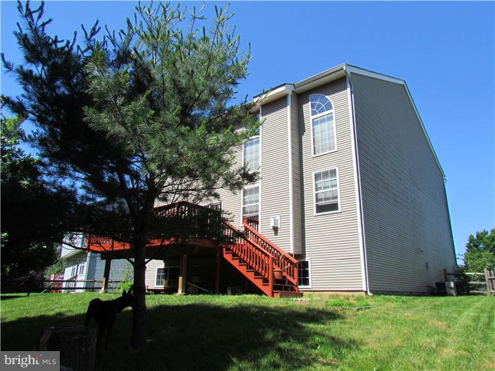 5 Coburn Road Pennington, NJ 08534 - Photo 25 of 25 a front view of a house with garden