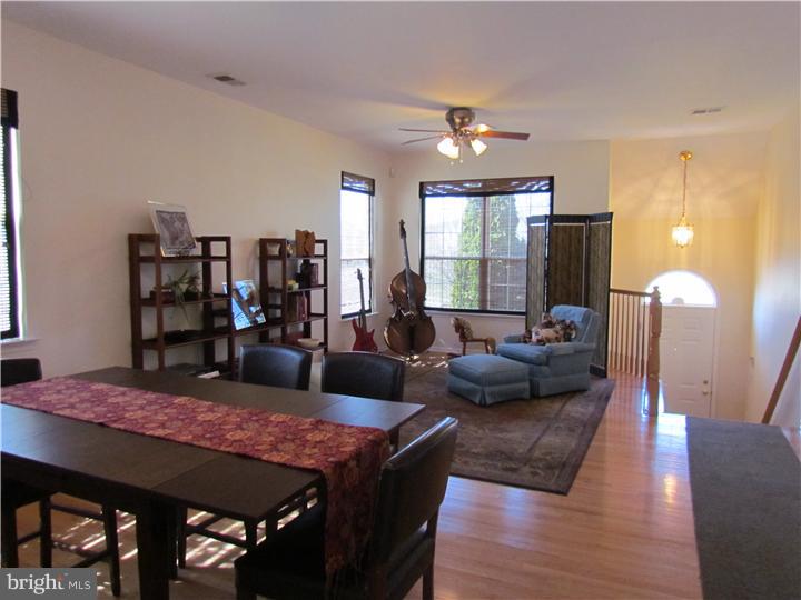 5 Coburn Road Pennington, NJ 08534 - Photo 4 of 25 a view of a dining room with furniture