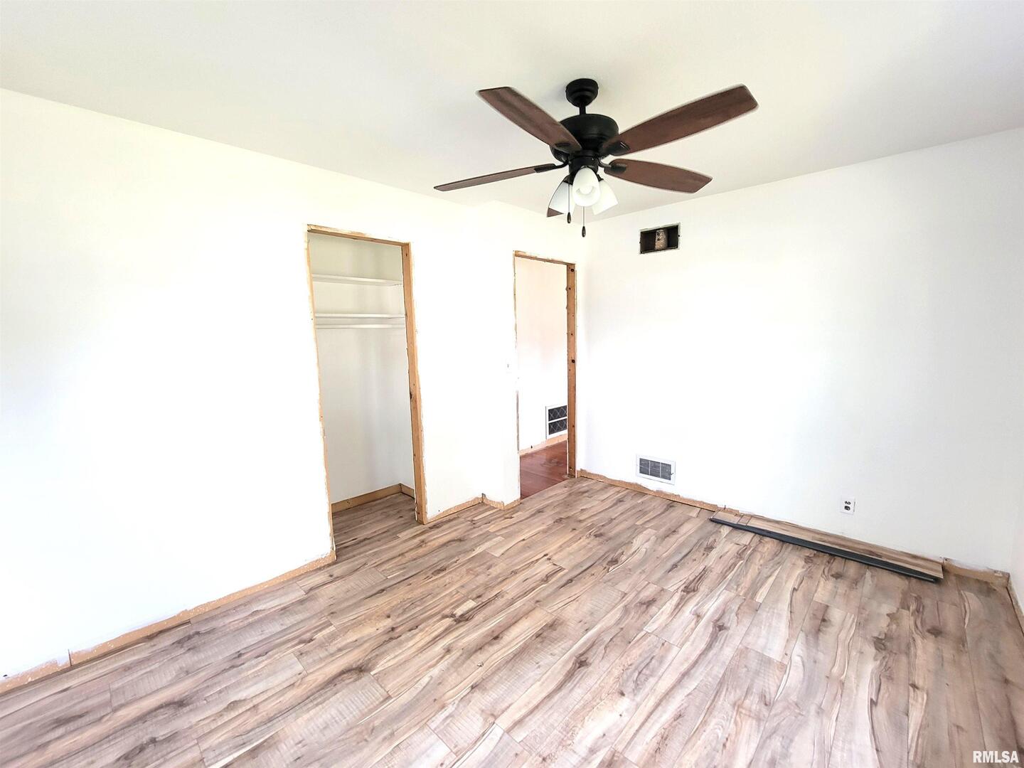 225 Hickory Street Flora, IL 62839 - Photo 33 of 56 a view of a big room with wooden floor