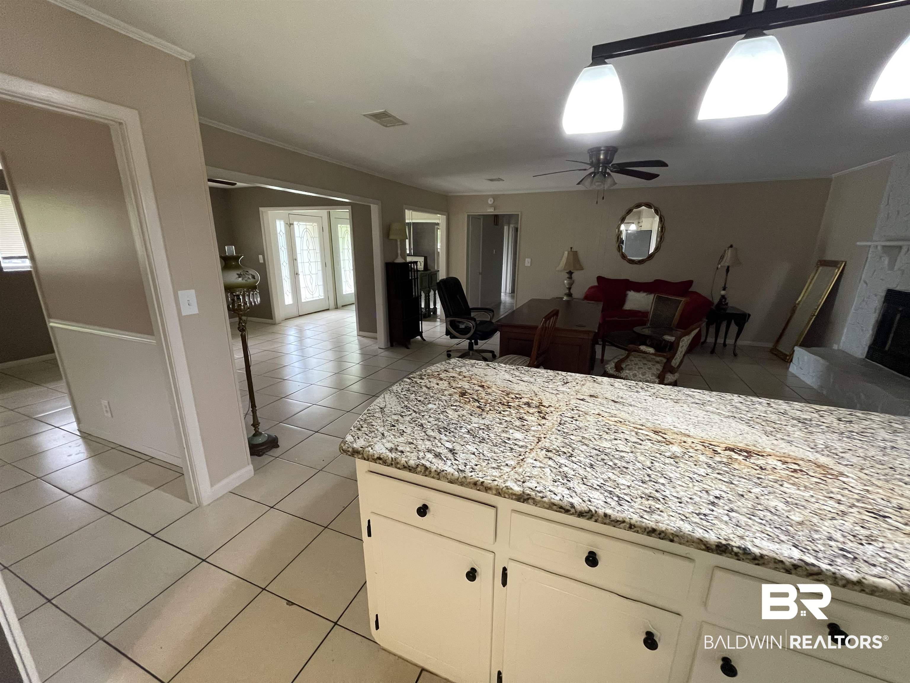 402 West Myrtle Avenue Foley, AL 36535 - Photo 14 of 38 Entry/Living/Dining Den