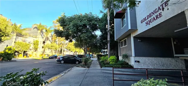 a view of multiple house with a yard