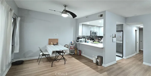 a kitchen with a sink cabinets and appliances
