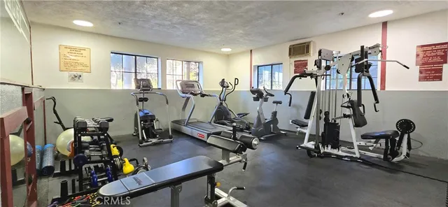 a view of a room with gym equipment