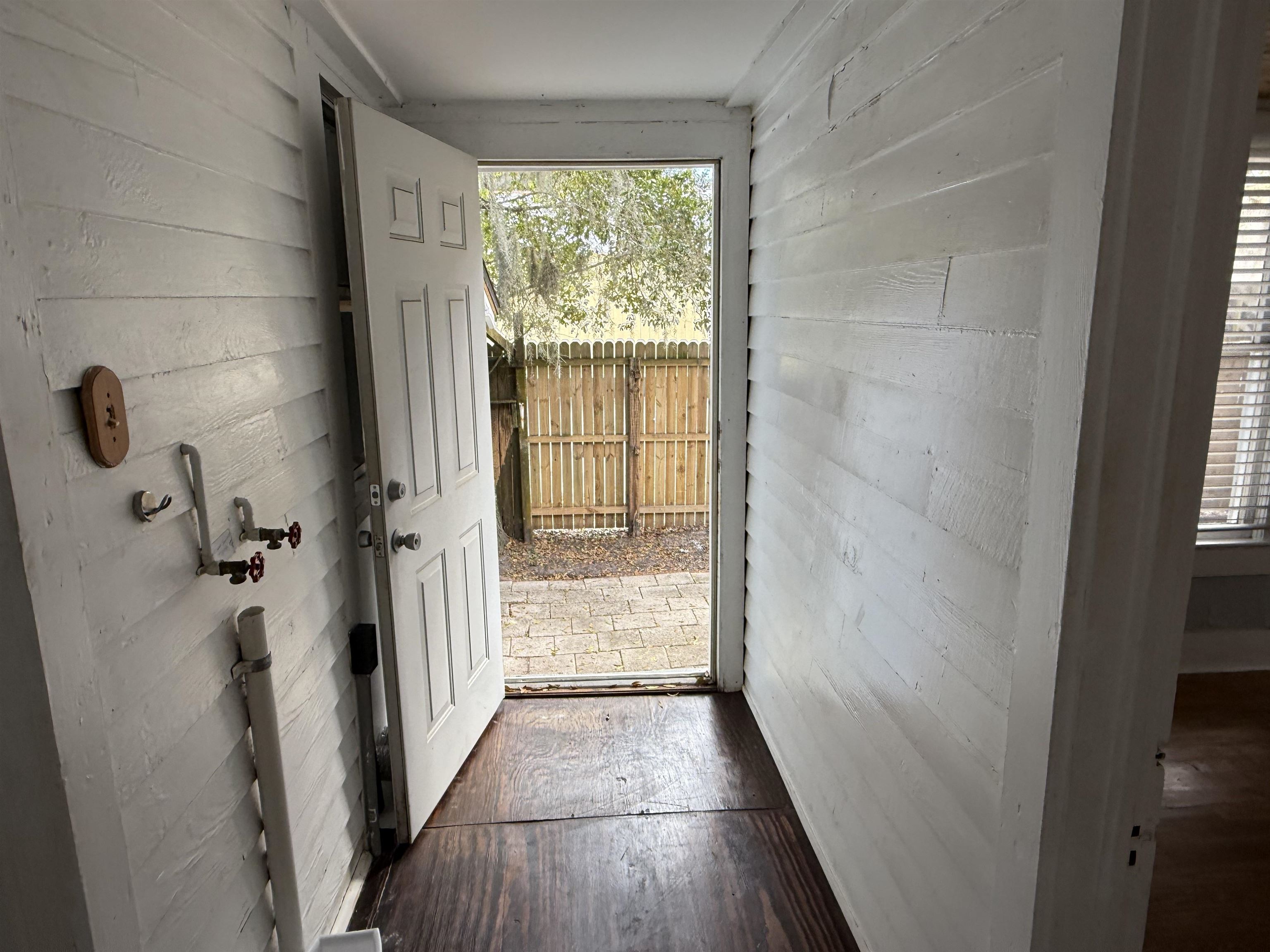 109 Bridge Street St. Augustine, FL 32084 - Photo 15 of 22 a view of a bathroom from a hallway