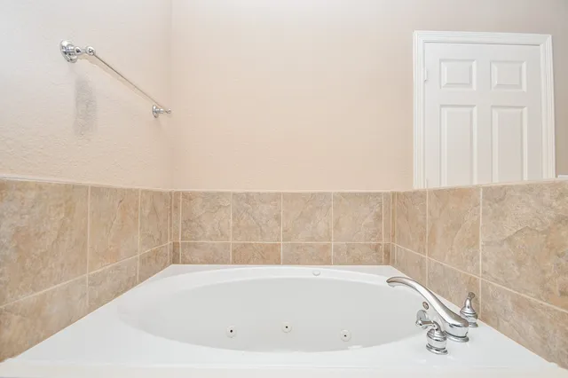 a bathroom with bathtub