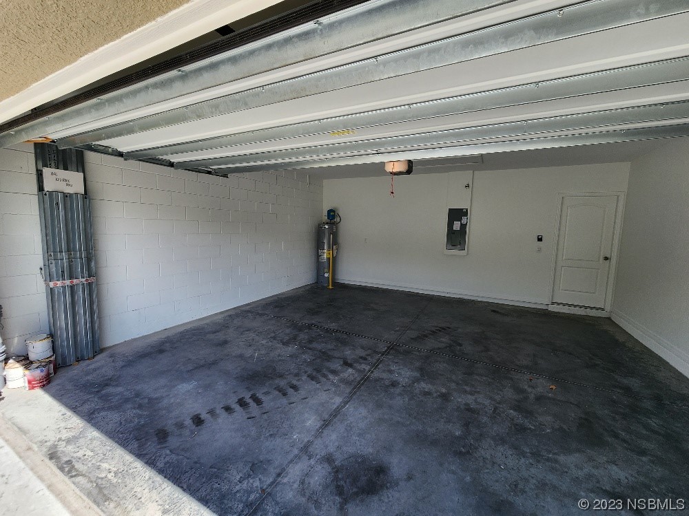 1841 Red Rock Road New Smyrna Beach, FL 32168 - Photo 14 of 22 a view of a garage