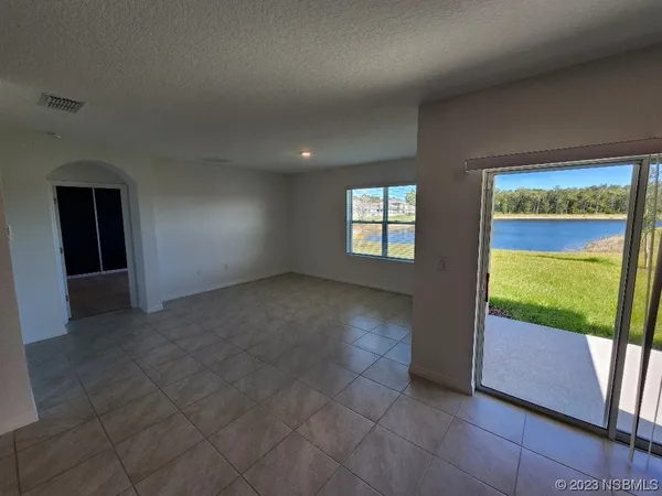 a view of an empty room and window