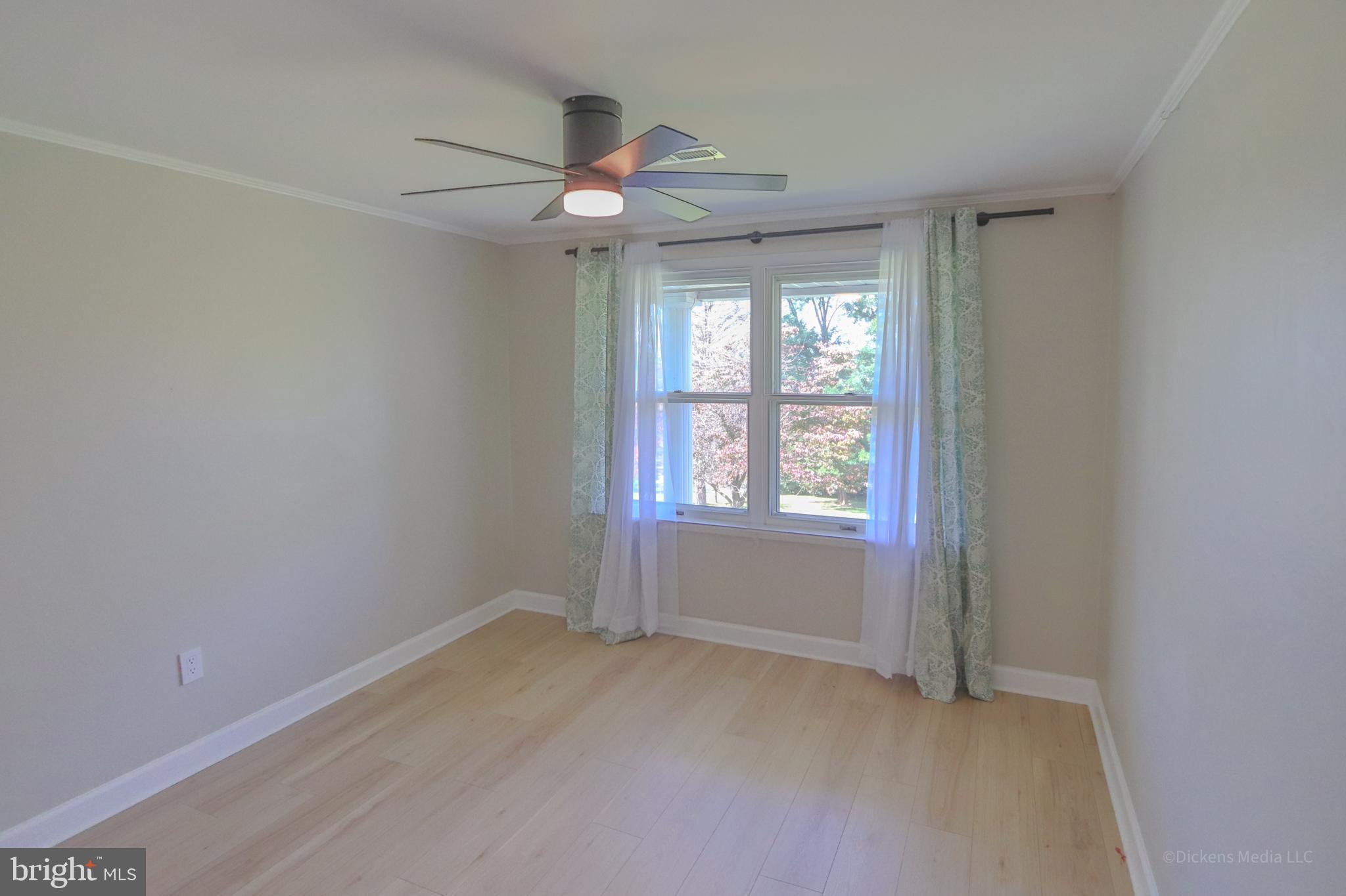25 John Owings Road Westminster, MD 21158 - Photo 13 of 32 a view of an empty room with a window