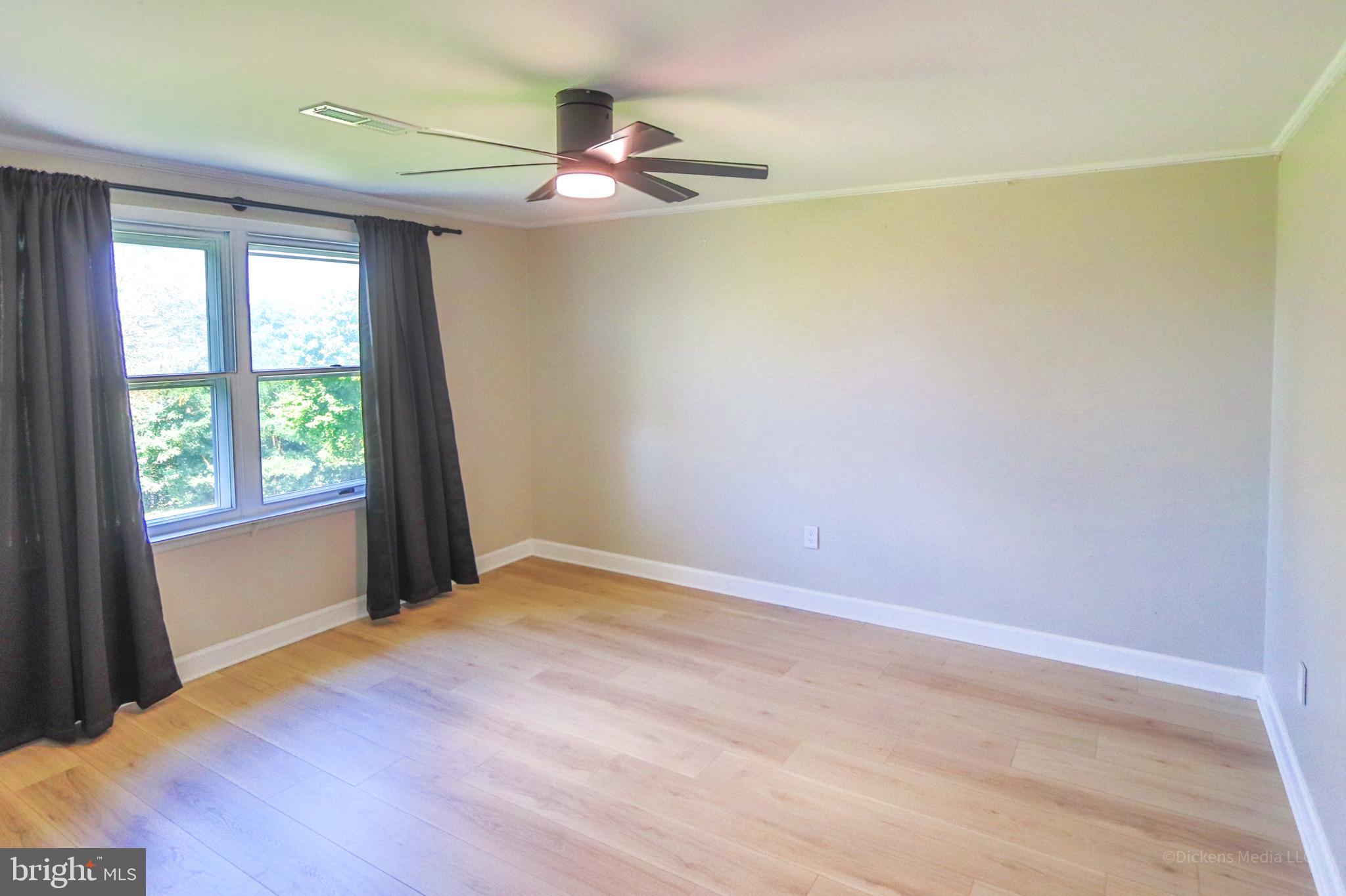 25 John Owings Road Westminster, MD 21158 - Photo 17 of 32 a view of an empty room with a window