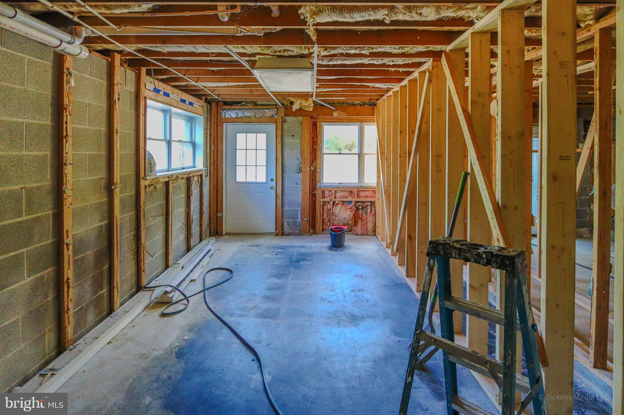 25 John Owings Road Westminster, MD 21158 - Photo 28 of 32 a view of a room with wooden floor and windows