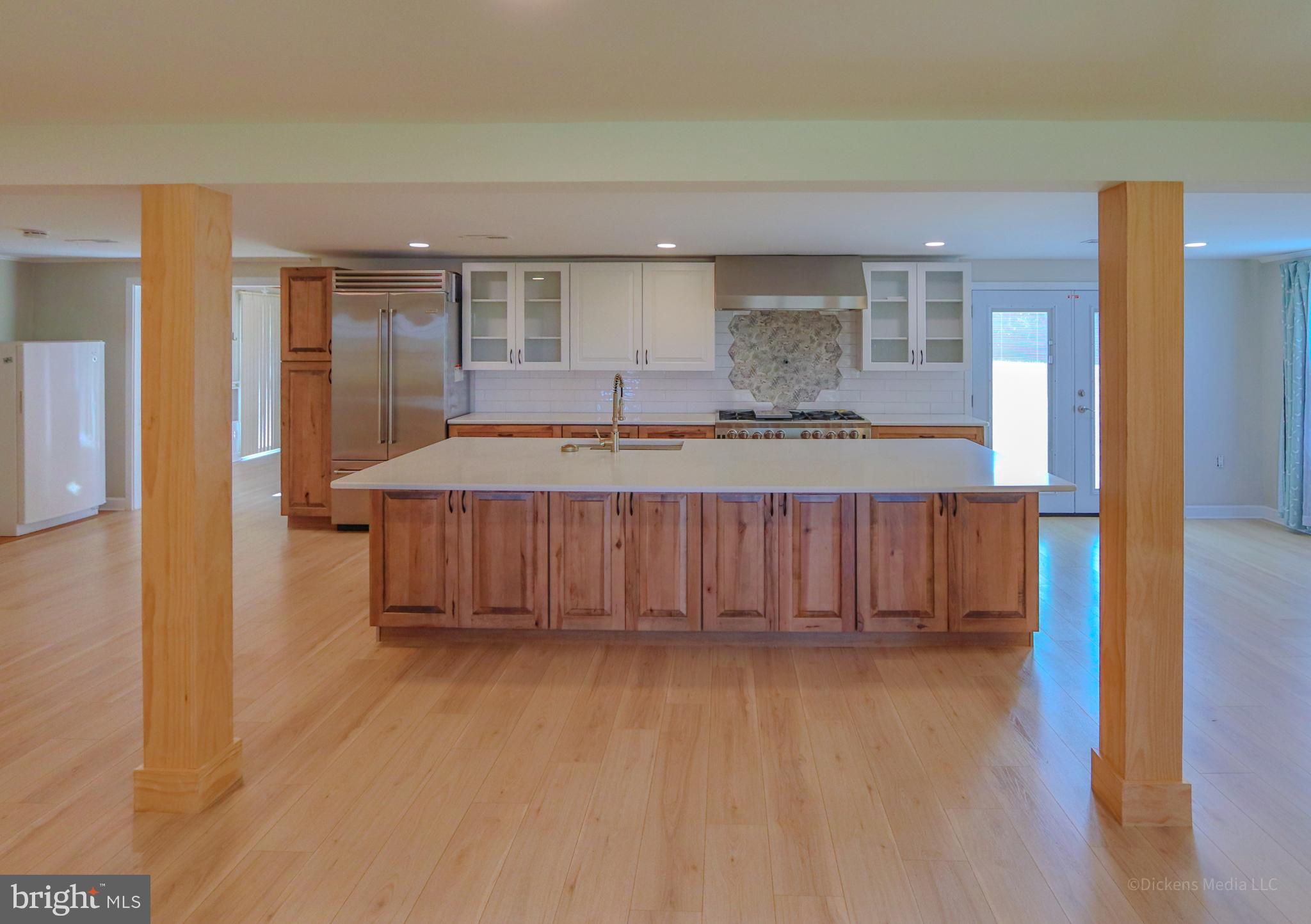 25 John Owings Road Westminster, MD 21158 - Photo 3 of 32 a bedroom with a bed and a view of kitchen