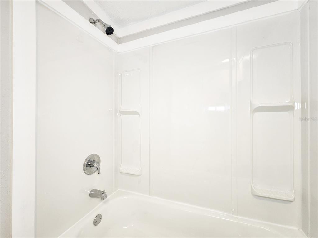 88 North Saturn Avenue Inverness, FL 34453 - Photo 36 of 44 a bathroom with a bathtub