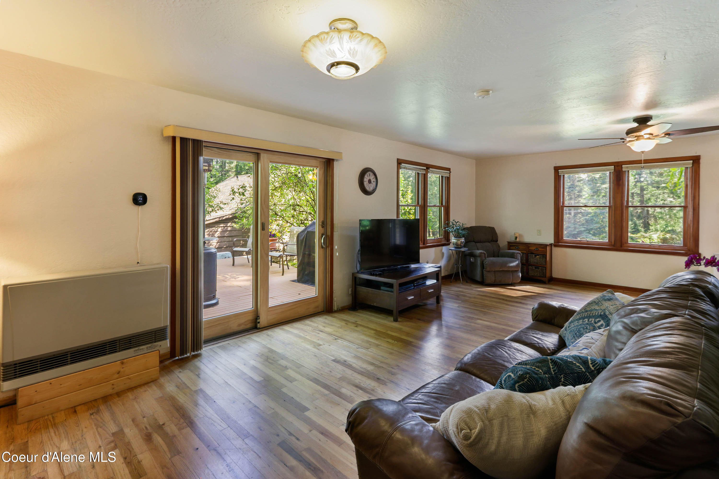 965 Denton Road Hope, ID 83836 - Photo 7 of 55 Living Room Slider to Large Deck