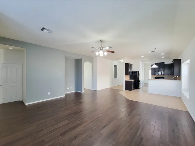 a view of a kitchen with a sink and a kitchen