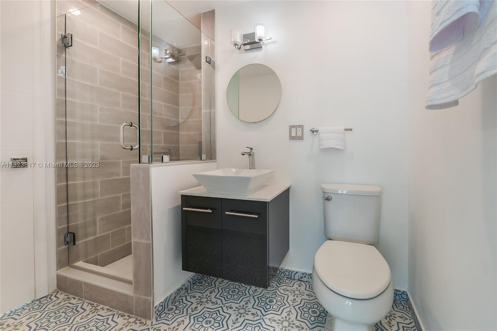 8540 Southwest 124th Street Miami, FL 33156 - Photo 12 of 22 a bathroom with a sink toilet and shower