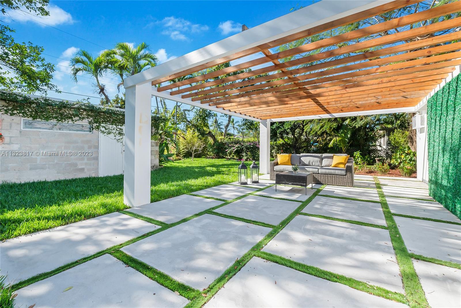 8540 Southwest 124th Street Miami, FL 33156 - Photo 14 of 22 a view of yard with patio