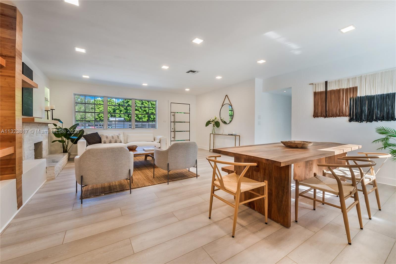 8540 Southwest 124th Street Miami, FL 33156 - Photo 2 of 22 a view of a dining room with furniture window and wooden floor
