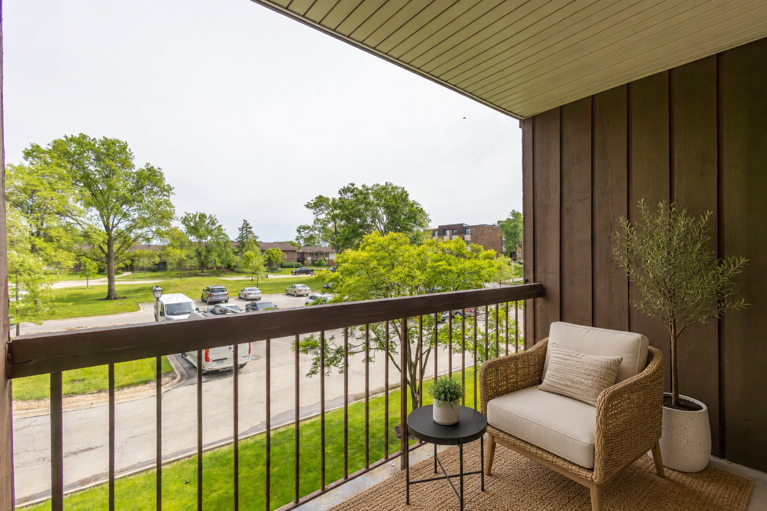 450 Raintree Court, Unit 2B Glen Ellyn, IL 60137 - Photo 21 of 28 a view of a chairs in a balcony
