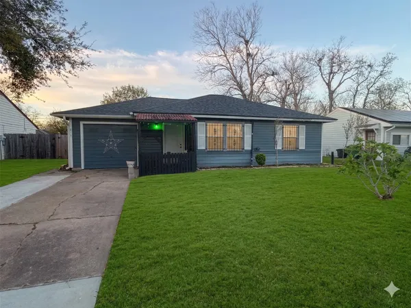 front view of house with a yard
