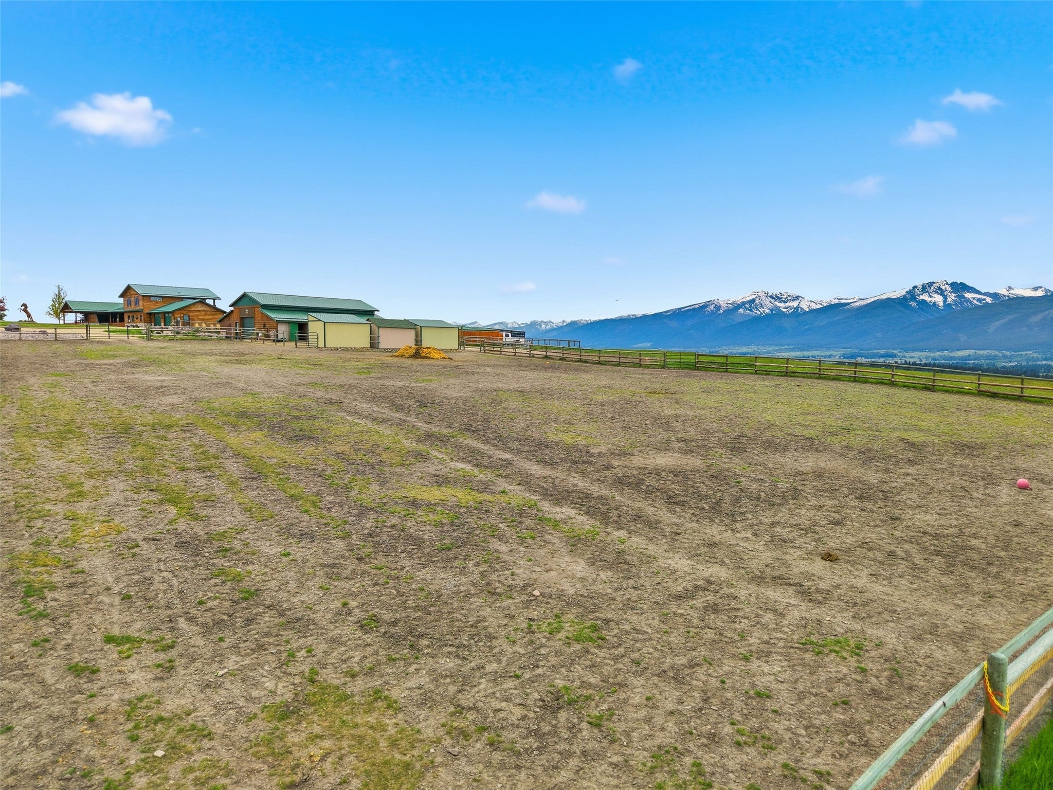 679 Hidden Valley Road North Florence, MT 59833 - Photo 72 of 85 Expansive fenced property with multiple structures, including a main residence and several outbuildings